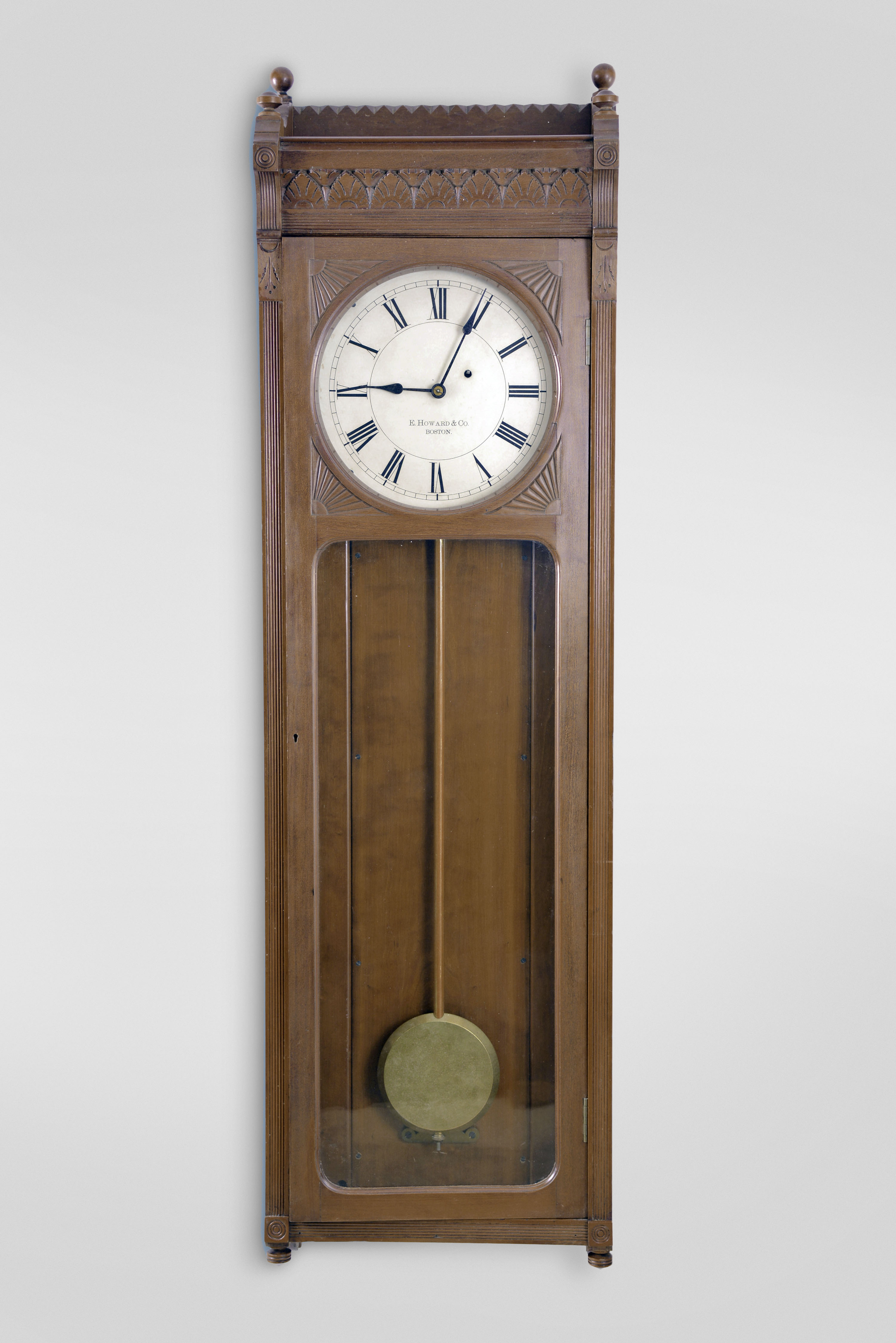 E. Howard &amp; Co., Boston, Mass., RARE "No. 58 Regulator- 12" wall clock, 8 day, time only, weight driven movement in a cherry case with 12" painted metal dial, gold leafed pendulum rod and damascened pendulum bob — Antique Clocks Price Guide