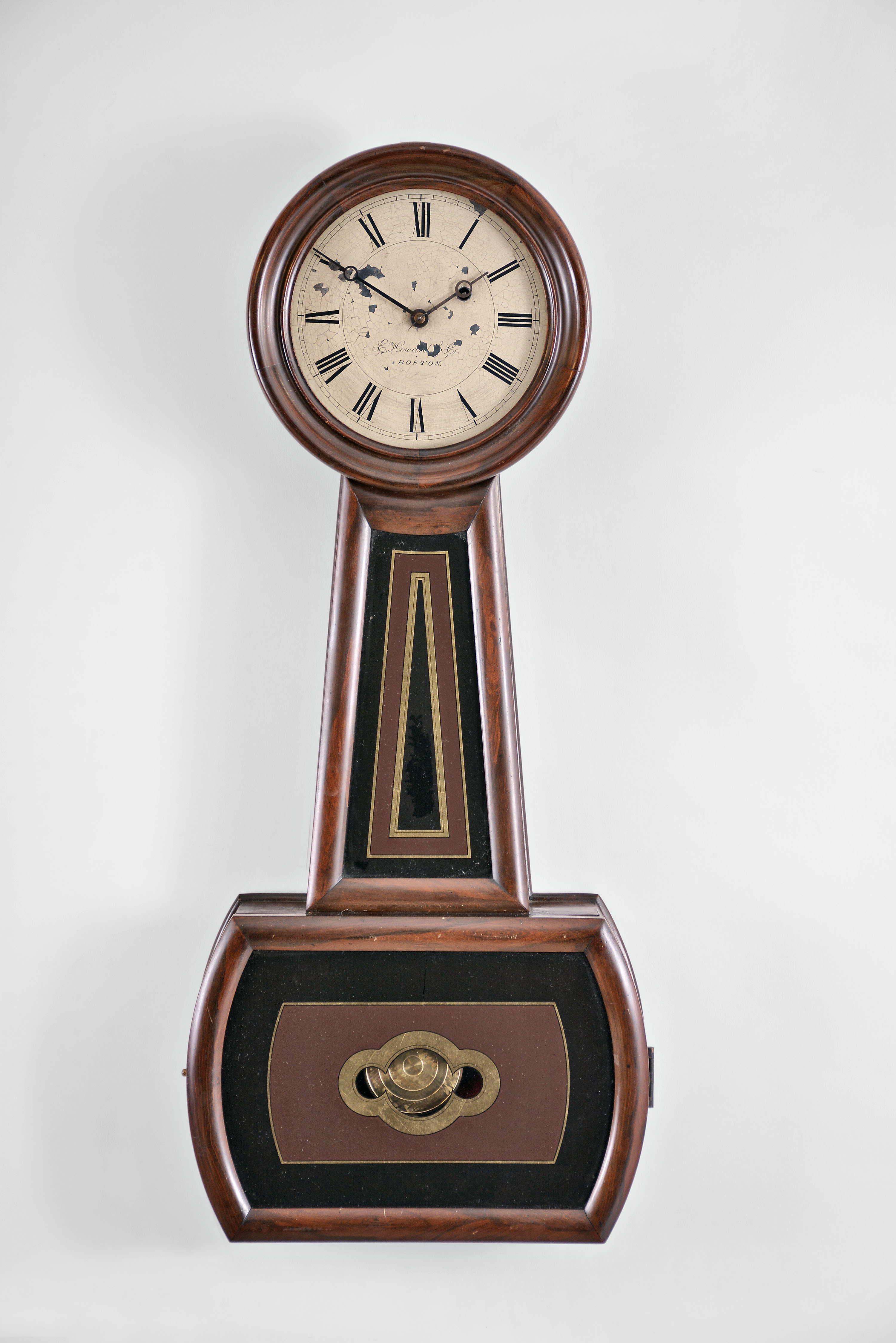E. Howard &amp; Co., Boston, Mass., "Regulator No. 4", banjo, 8 day, weight brass movement rosewood grained case wall timepiece. Case is stamped "64 ". — Antique Clocks Price Guide