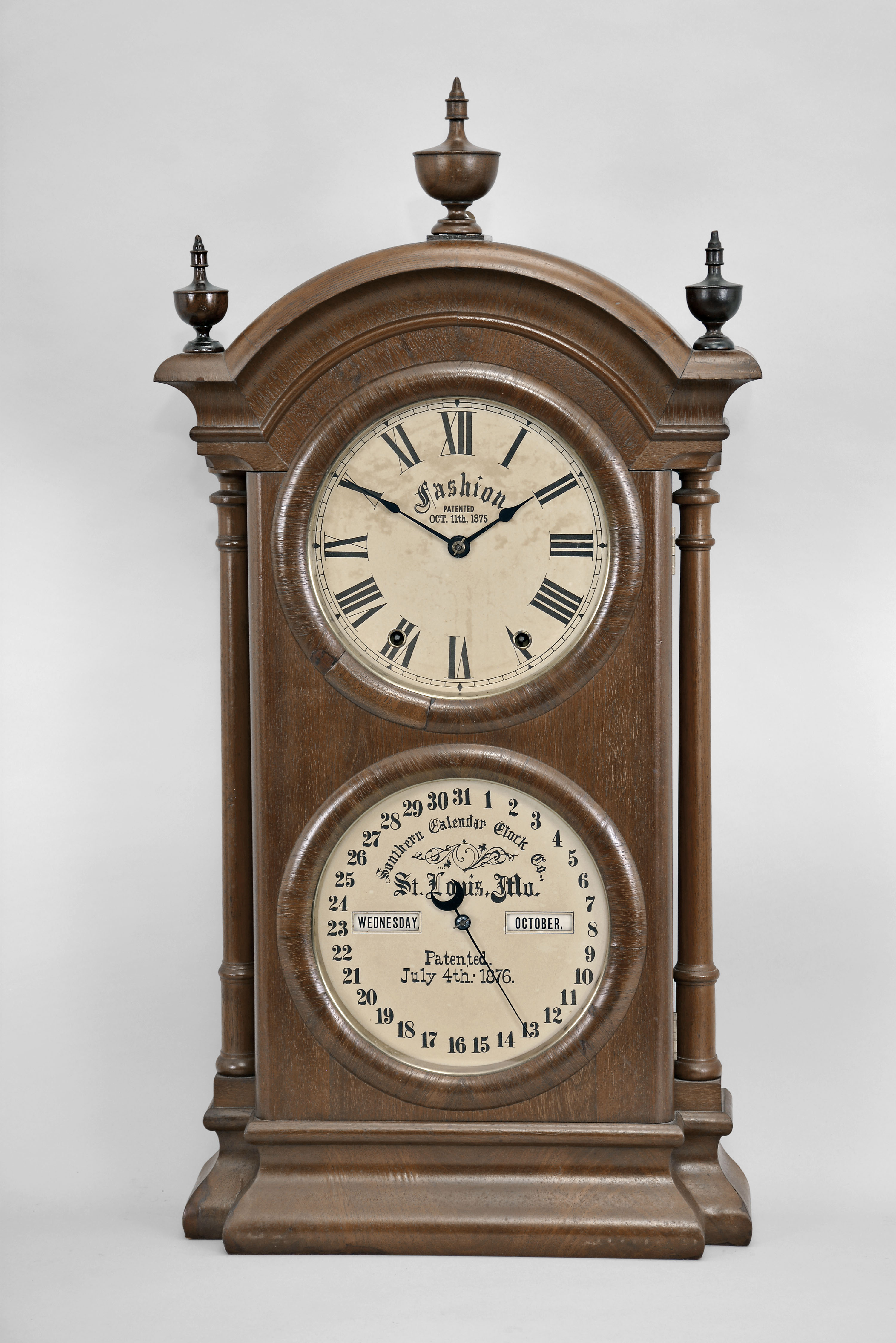 Southern Calendar Clock Co., St. Louis, Mo., "Fashion No. 2" shelf clock with a Seth Thomas spring driven, 8 day, time and strike movement and a R. T. Andrews perpetual calendar mechanism in a walnut case. — Antique Clocks Price Guide