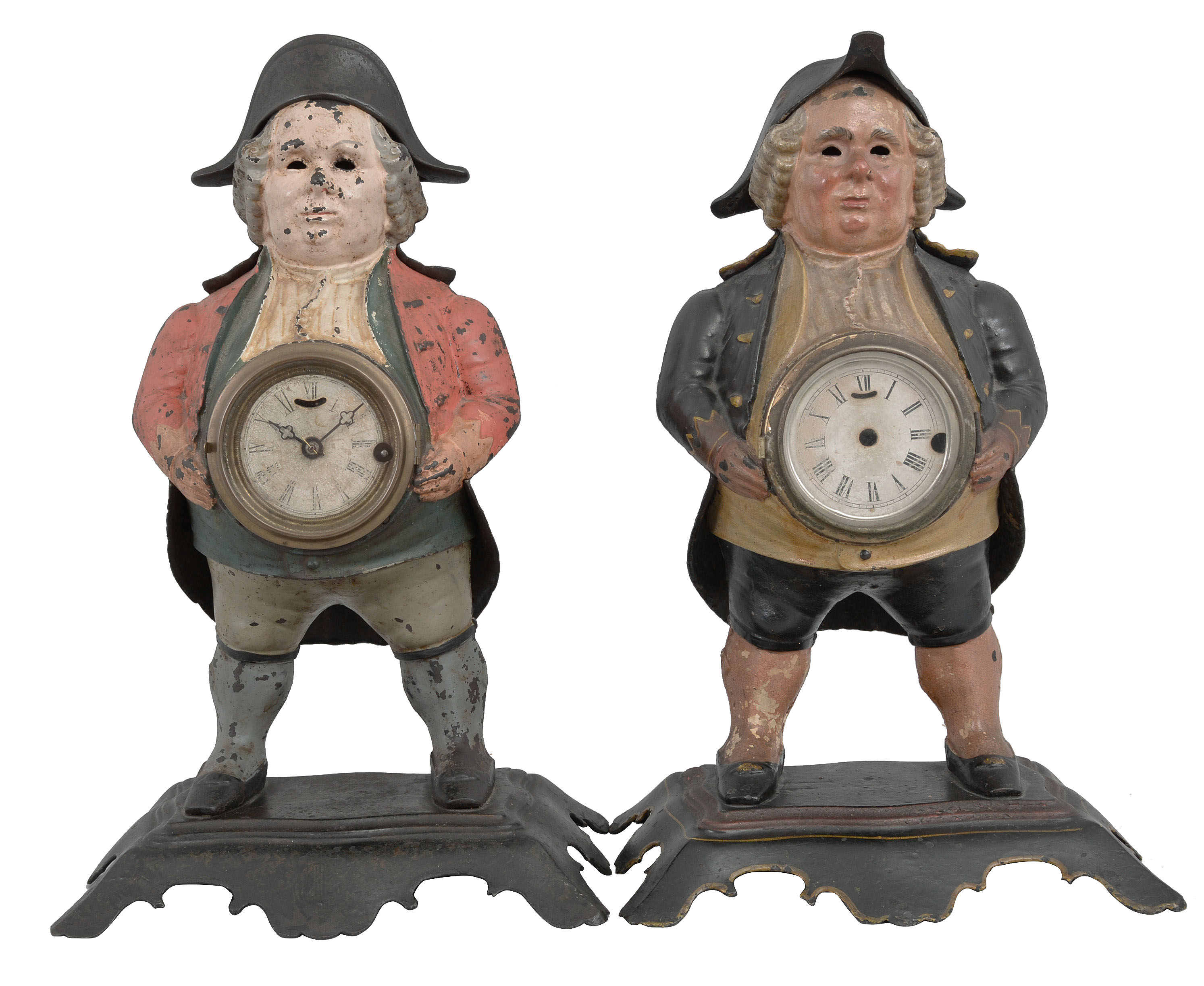 Blinking Eye Clocks- 2 (Two): (1) Bradley &amp; Hubbard, Meriden, Conn., "Continental" blinking eye or winker clock, 30 hour, spring driven balance wheel movement in a cast iron case featuring a continental soldier in a red coat with bicorn hat, c1856; (2) Bradley &amp; Hubbard, Meriden, Conn., "Continental" blinking eye or winker case in cast iron featuring a continental soldier with blue coat and tricorn hat, c1856. — Antique Clocks Price Guide