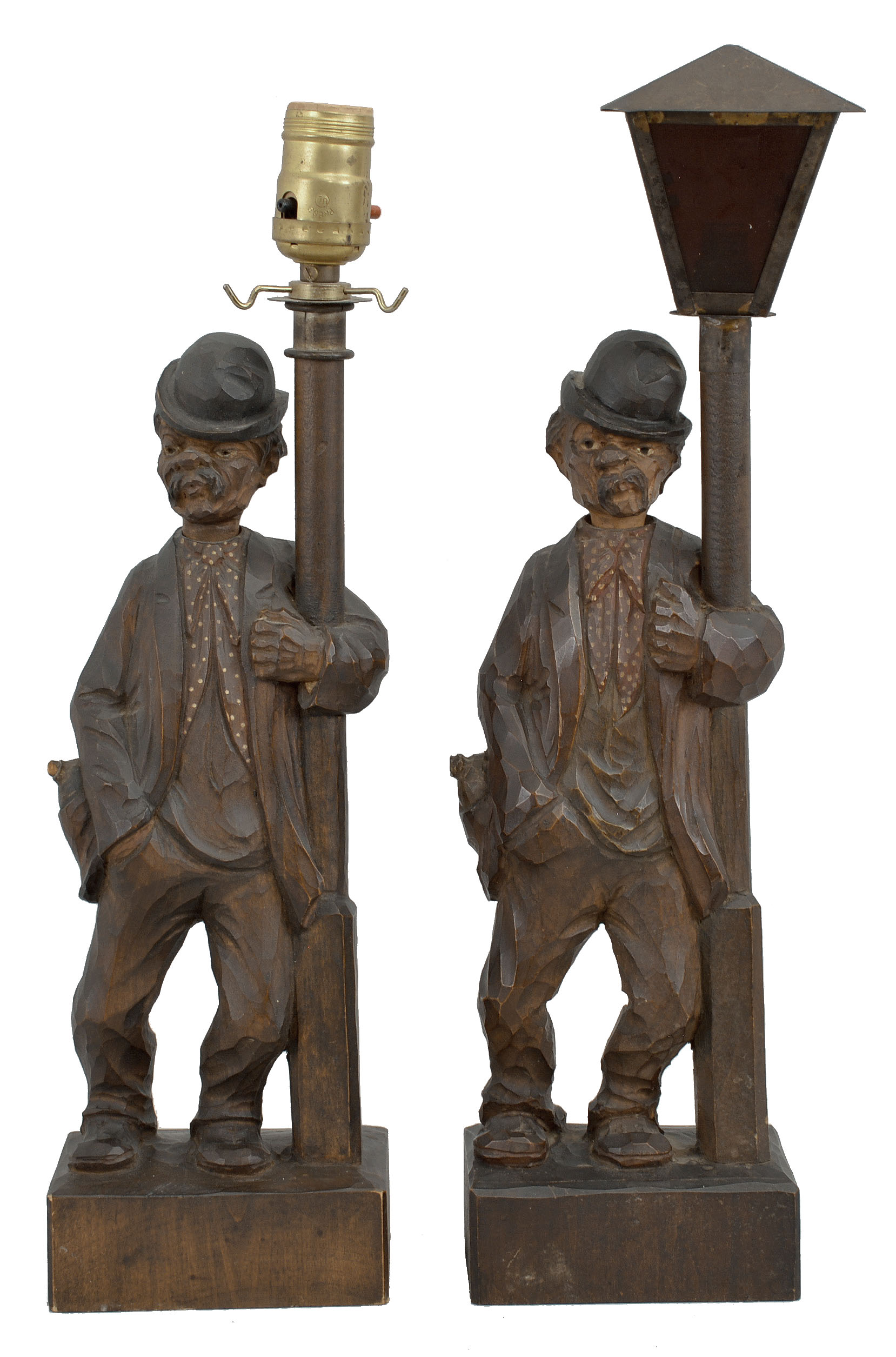 Whistlers- 2 (Two): Karl Griesbaum, Triberg, Germany, carved "Hobo" or "Drunkard" whistling figures, spring driven brass movements driving bellows with cam-controlled whistle and head-turning animation enclosed in hand carved figures depicting inebriated men in bowler hats leaning on lamp posts. — Antique Clocks Price Guide
