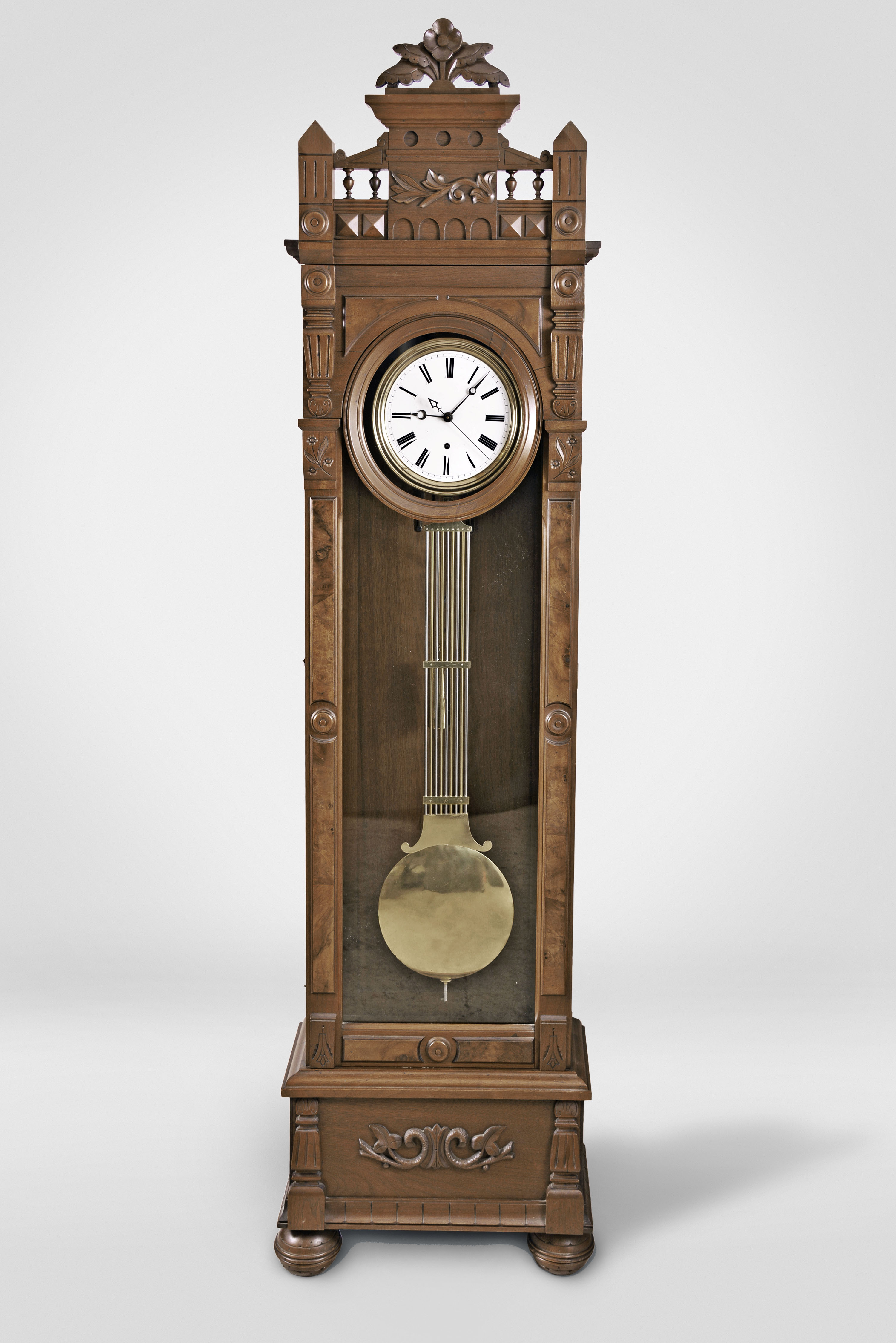 Standing Jeweler's Regulator, 8 day, time only, weight driven Swiss pinwheel movement with a gridiron lyre pendulum and sweep seconds in a carved walnut and walnut burl case with white enamel dial — Antique Clocks Price Guide