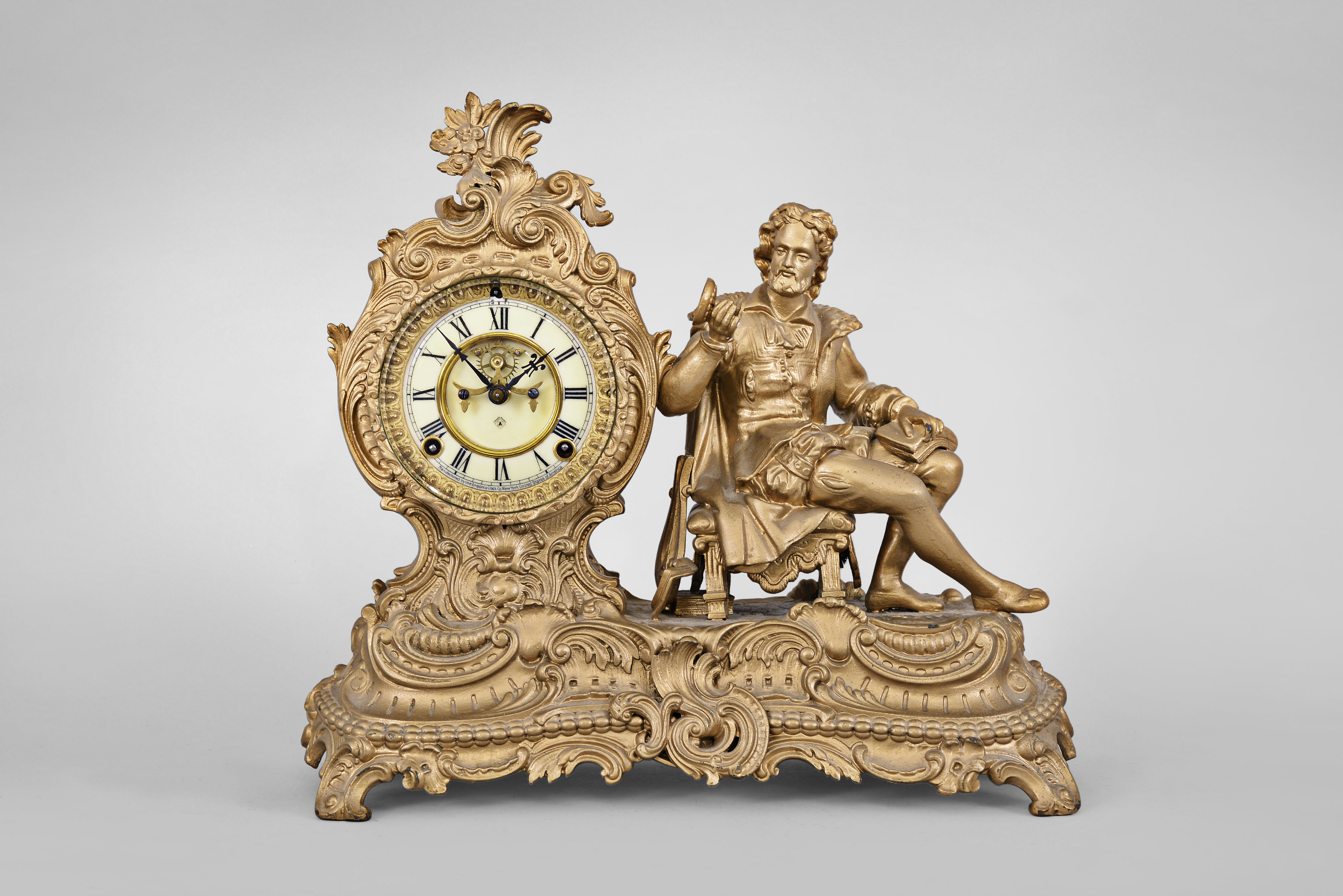 Clocks- 6 (Six): (1) Seth Thomas steeple clock with German movement, 8 day, time and strike movement in an ash case, c1960; (2) Miniature acorn clock with German movement, time only, c1970; (3) Seth Thomas mantel clock, 8 day, time and strike, 120 movement in an Art Deco style wood case, c1930; (4) Ansonia Clock Co., "Arion" figural mantel clock, 8 day, time and strike, visible Brocot escapement, c1894; (5) and (6) Horolovar Co., New York, "Ignatz", flying pendulum novelty timepieces. — Antique Clocks Price Guide