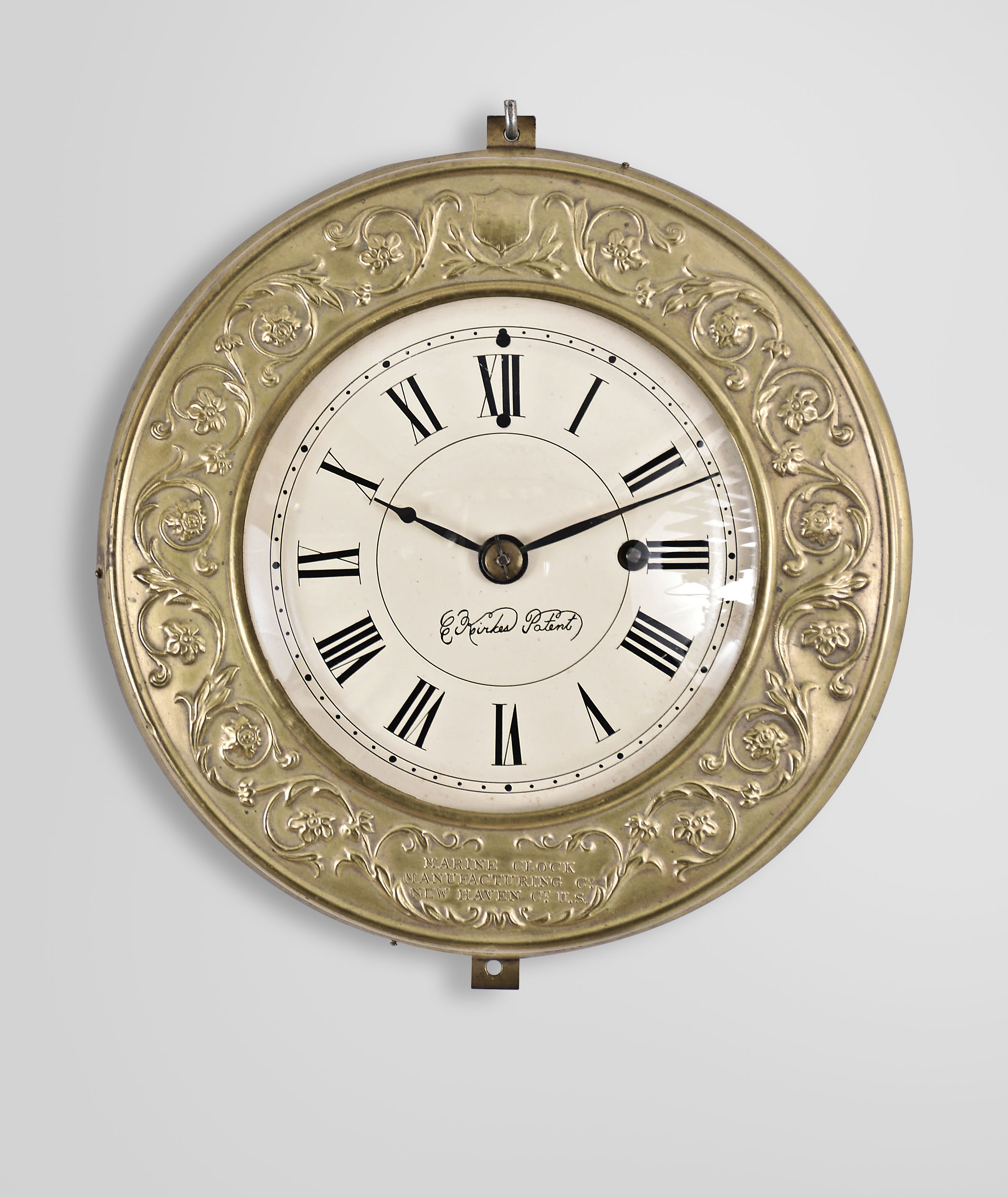 Marine Clock Manufacturing Co., New Haven, Conn., 8 day, spring, balance wheel brass movement with an iron backplate wall timepiece patented by Charles Kirk. — Antique Clocks Price Guide