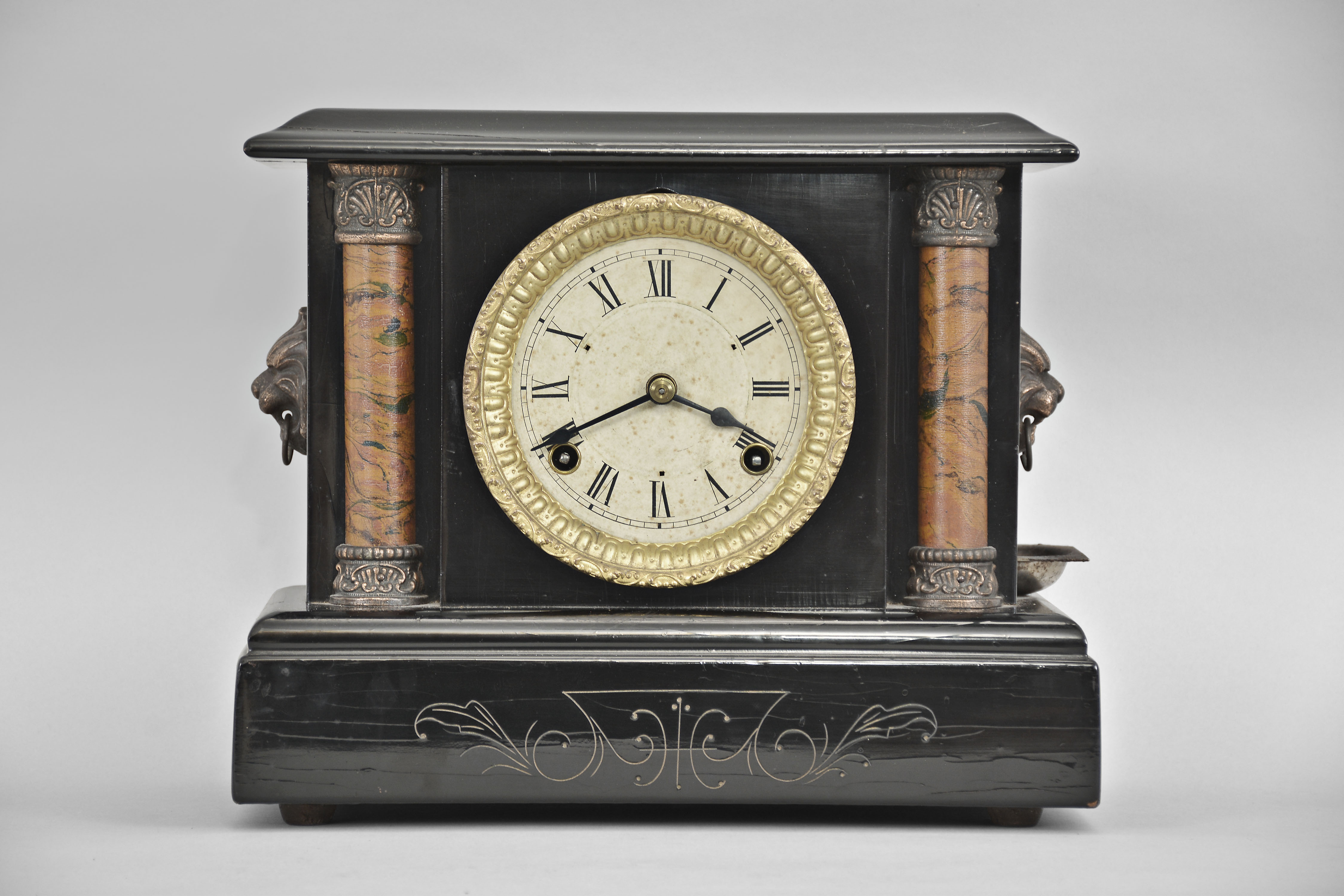 Loheide Manufacturing Co., St. Louis, Missouri, "Wizard" 8 day, time and strike spring brass lever movement black mantel clock / trade stimulator. — Antique Clocks Price Guide
