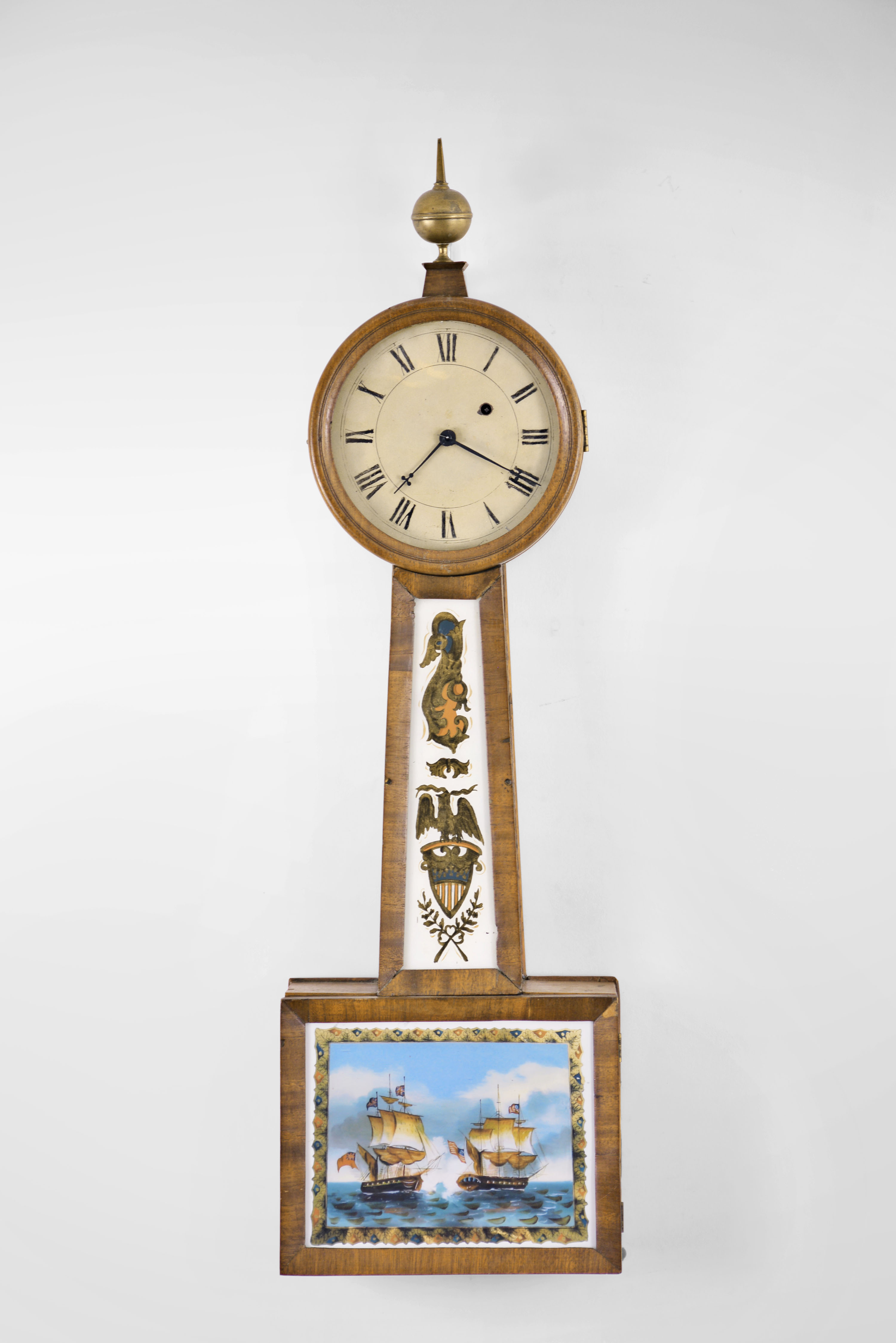 Massachusetts, Possibly a North Attleboro maker, 8 day, weight brass movement patent or banjo timepiece retailed by J. J. Beals &amp; Son, Boston. — Antique Clocks Price Guide
