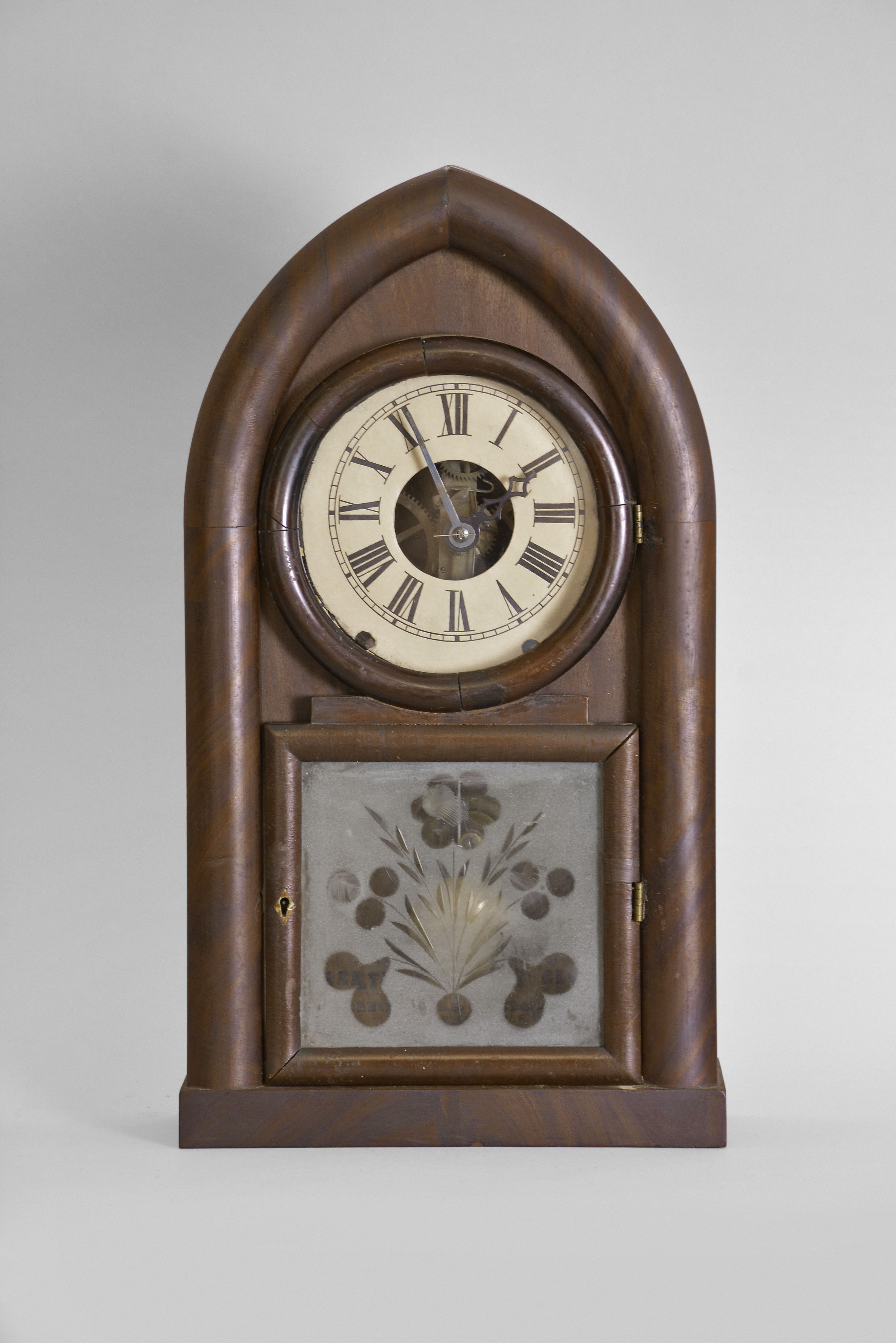 Brewster &amp; Ingrahams, Bristol, Conn., 8 day, time and strike spring brass movement round gothic or beehive shelf clock with rack and snail strike and case iron spring barrels. — Antique Clocks Price Guide