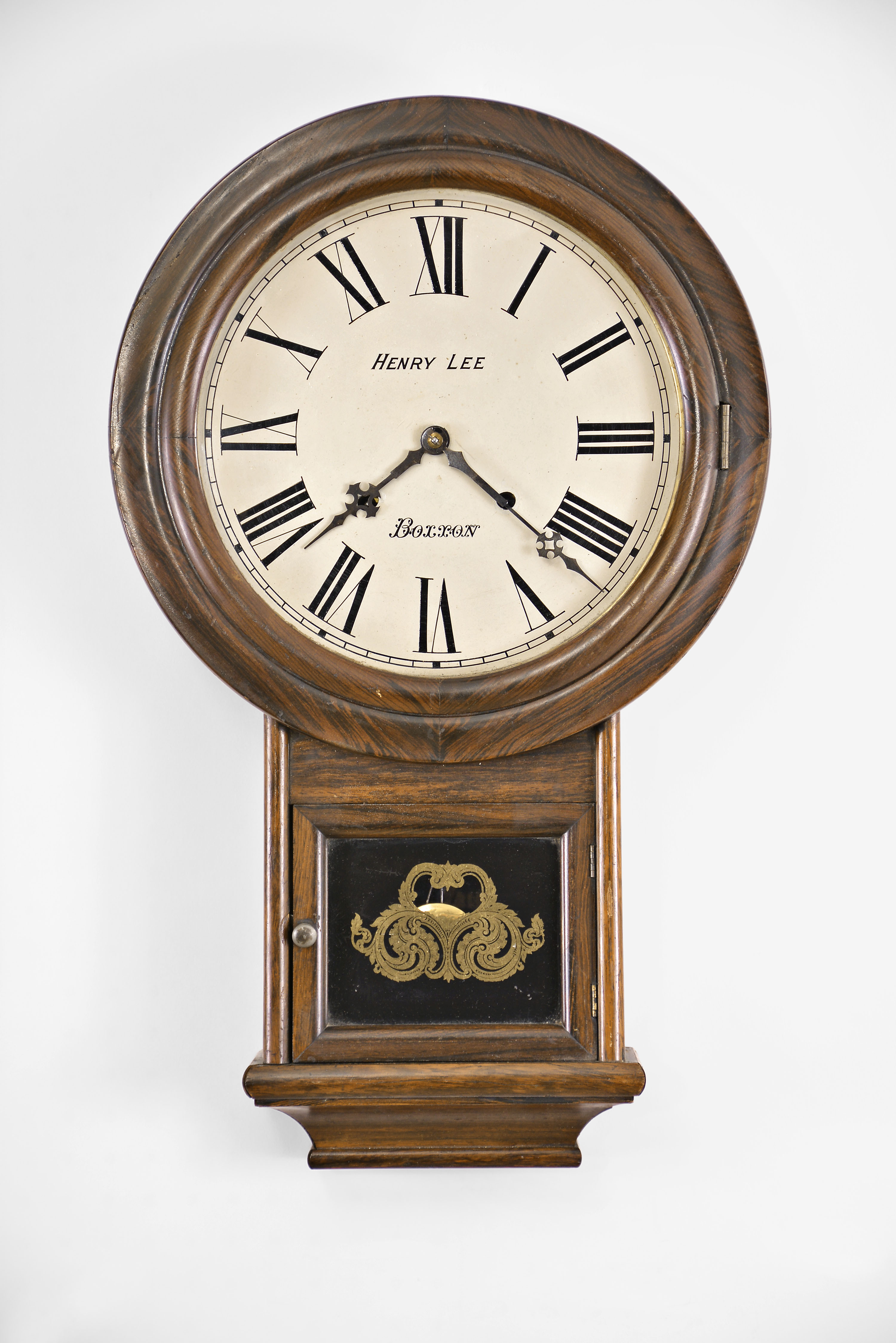 Welch, Spring, &amp; Co., Forestville, Conn., "Round Head Drop" wall hanging clock with a spring driven 8 day time and strike movement with a painted dial reading "Henry Lee / Boxxon" in a rosewood case. — Antique Clocks Price Guide
