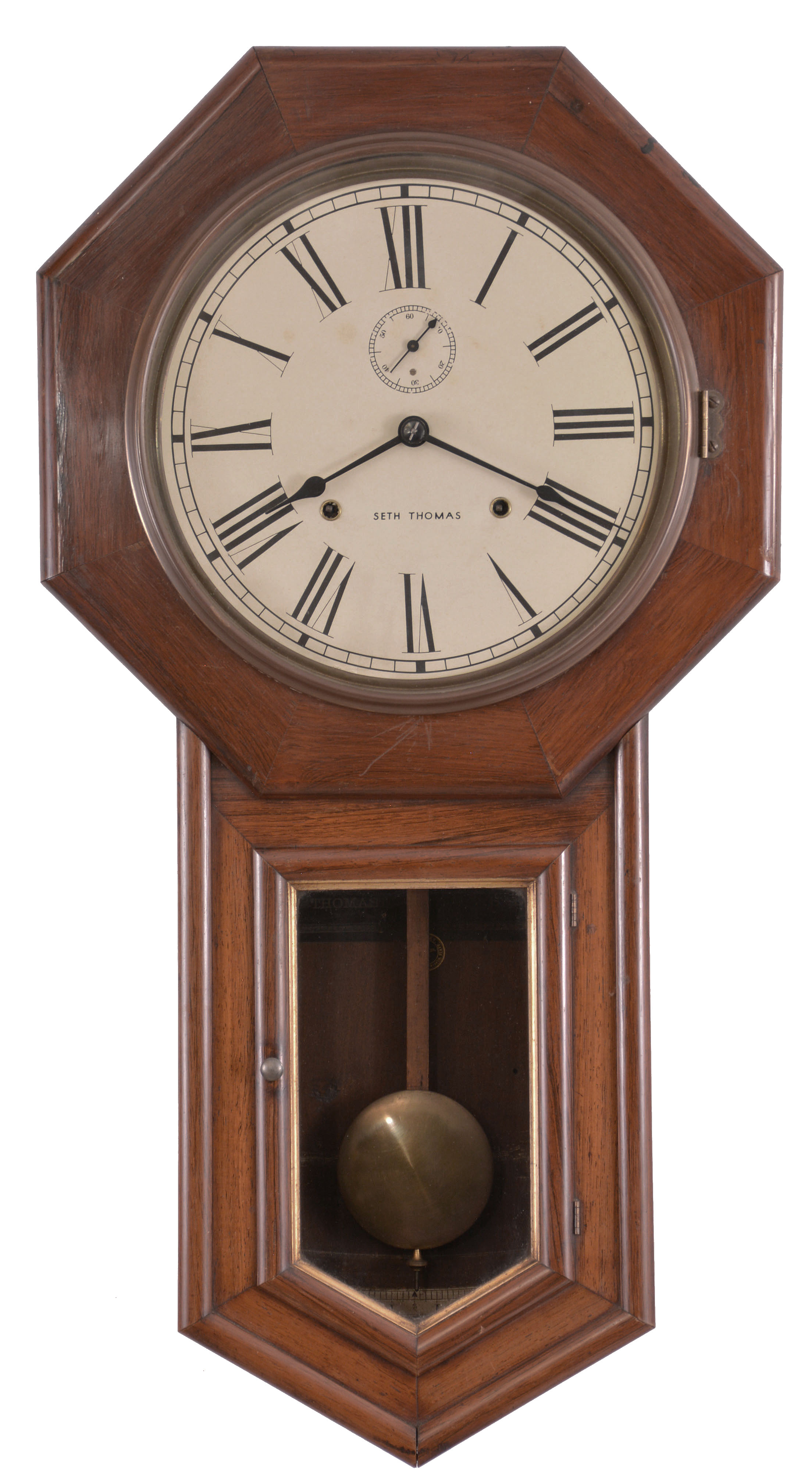 Clocks- 2 (Two): (1) E. N. Welch Mfg. Co., Forestville, Conn., "Verdi" hanging clock with a spring driven, 8 day, time and strike movement is a rosewood veneered case. c1880. (2) Seth Thomas Clock Co., Thomaston, Conn., "World" wall hanging clock with a spring driven 8 day time and strike movement in a rosewood veneered case. c1896. — Antique Clocks Price Guide