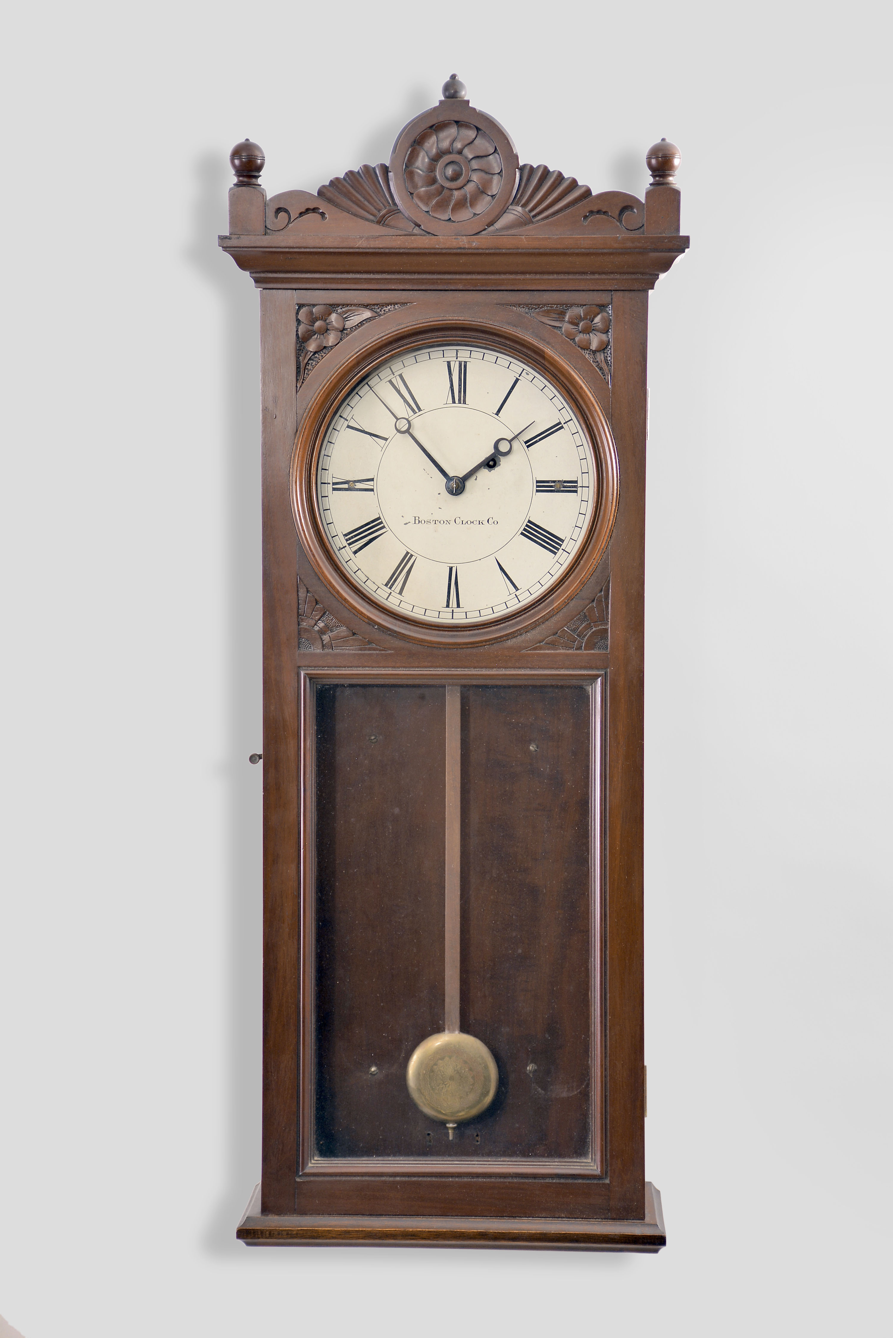 Boston Clock Co., Boston, Mass., unidentified wall clock with a weight driven 8 day timepiece movement in a cherry case. — Antique Clocks Price Guide