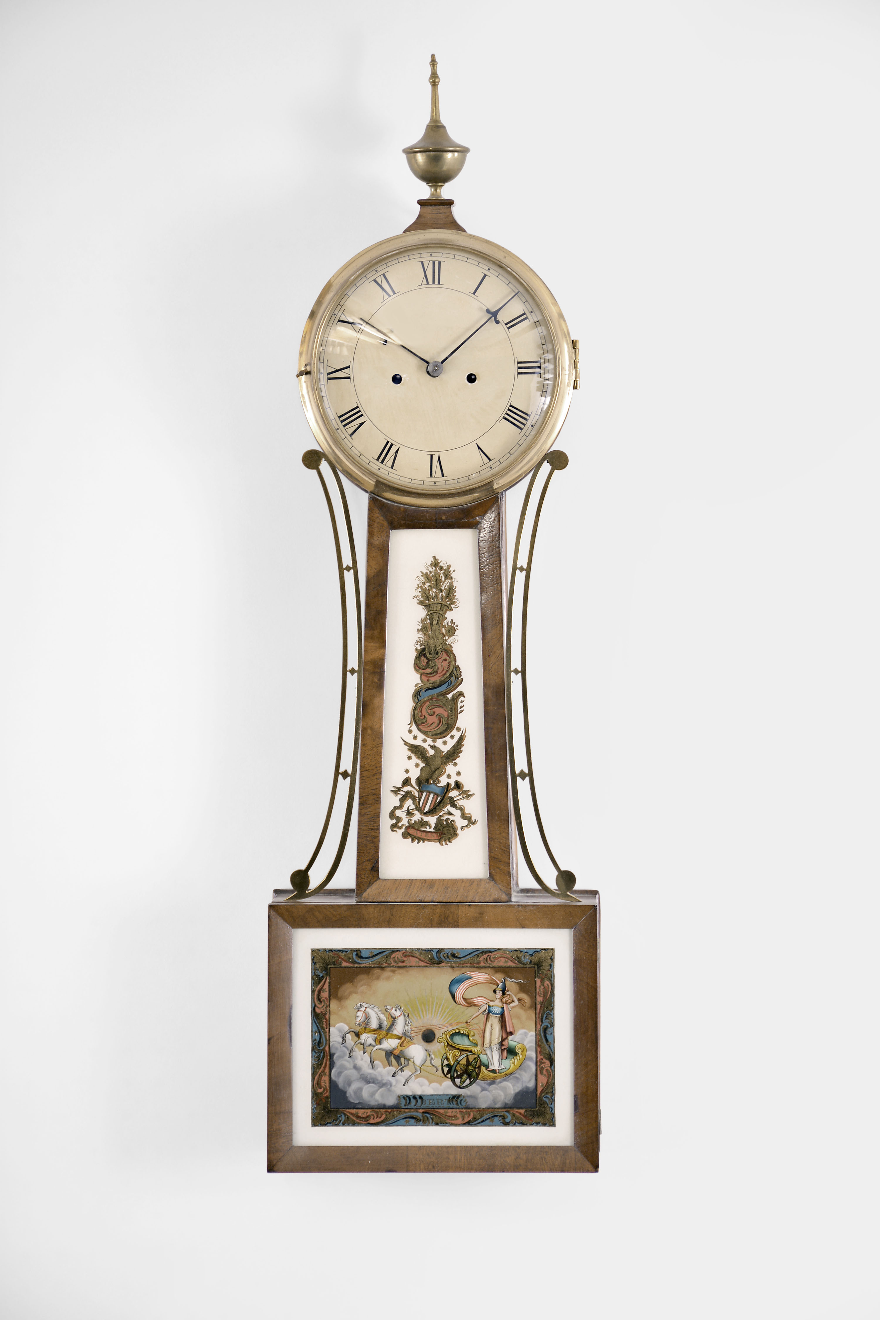Massachusetts, possibly Stephenson, Howard &amp; Davis, Boston, Mass. 8 day, time and strike weight brass movement patent or banjo timepiece. The use of a three pillar design with two access holes through the front plate leads to the attribution. See "Willard's Patent Time Pieces by Paul J. Foley", Pg. 155. — Antique Clocks Price Guide