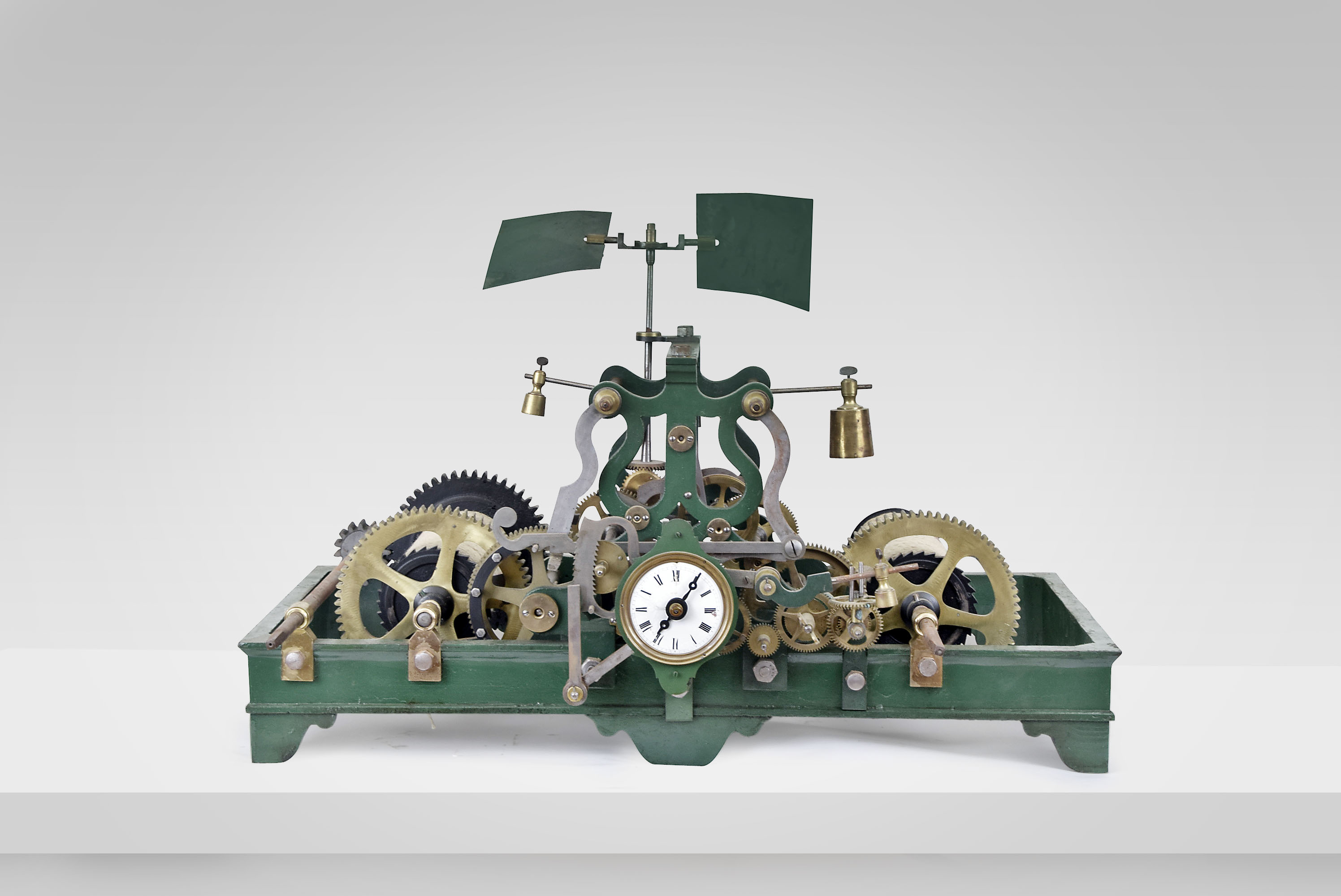 Europe, tower clock, time and strike, weight driven movement with pinwheel escapement and indicator dial in a green painted cast iron frame — Antique Clocks Price Guide