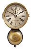 Seth Thomas Clock Co., Thomaston, Conn., "Ship's Bell" clock, 30 hour, time and ship's bell strike, spring driven, balance wheel movement in a brass case with outside bell, silvered dial, and blued steel hands, all mounted to a wood backboard.