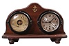 Chelsea Clock Co., Boston, Mass., timepiece and barometer set, 8 day, time only, spring driven, jeweled movement with a lever escapement, center seconds, in a black phenolic case with silvered dial, aneroid barometer in a matching phenolic case under Chelsea's "Boston" label, both mounted to a walnut base.