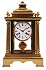 Marshall and Sons, Paris, crystal regulator, 8 day, time and strike, spring-driven pendule de Paris movement in a polished brass architectural case with four fluted columns and four beveled glasses, white enamel dial with Roman numerals and blued steel spade hands.