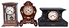 Clocks- 3 (Three) French Mantel Clocks: (1) W.B. Promoli, Paris, mantel clock, 8 day, time and strike, spring-driven movement with silk thread suspension in a rosewood case with floral boulle work, the engine turned silvered dial is signed by the maker; (2) S. Marti et Cie., Paris, crystal regulator, 8 day, time and strike, spring-driven movement in a brass and glass case with white porcelain dial; (3) S. Marti et Cie., Paris for Chas. W. Kennard & Co., Boston, mantel clock, 8 day, time and strike, spring-driven pendule de Paris movement in a black slate case with green malachite insets and white enamel dial.