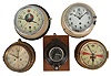 Clocks- 5 (Five) English, German, and Russian Marine Clocks: (1) Smiths Astral radio room ship's clock in a brass case; (2) Junghans ship's clock in a white metal case; (3) Salem time and ship's bells with German movement in a brass case; (4) Kienzle sealed clock, probably for maritime use; (5) Russian submarine clock with mounting board.