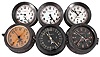 Clocks- 6 (Six) Chelsea Deck or Engine Room: Chelsea Clock Co., Boston, for U.S. Navy, "Deck & Engine Room" clocks, 8 day, time only, spring-driven balance wheel movements in black phenolic cases with hinged bezels, white, black and silvered dials with center seconds.