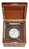 Hamilton Watch Co., Lancaster, Penn., model 22 chronometer watch with wind indicator, 35 size, 21 jewels, stem wind, pin set, adjusted to 6 positions and temperature, straight line damascened nickel plate movement, with lever escapement and micrometric regulator, Arabic numeral silvered metal dial, black steel spade and poker hands, the timepiece contained in a correct but associated gimbaled bowl, and mounted in a mahogany box, and with padded cherry outer box with leather strap, movement marked "U.S. Navy Bu. Ships- 1942", serial #2F4289