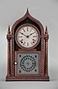 Forestville Manufacturing Co., (J. C. Brown), Bristol, Conn. 8 day, time and strike spring brass movement ripple front 4-column O.G. gothic or onion top shelf clock.