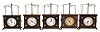 Clocks- 5 (Five) Ignatz Flying Pendulum: Horolovar Clock Co., Bronxville, New York, reproduction "Ignatz Flying Pendulum" novelty clock, 8 days, time only, spring-driven movement with flying pendulum in wood cases with paper dials. These are German-made reproductions of the 19th century model made by the New Haven Clock Co. under the Jerome label.