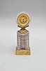 France, a gilt bronze and cut glass desk timepiece, egg and dart molded plinth with rectangular, diamond pattern, cut, colorless glass pedestal, supporting a gilt, acanthus ornamented cradle, holding the round, diamond cut timepiece case, gilt bezel, roman numeral gilt dial with blued steel Breguet style hands, and 30 hour, full plate verge fusee watch movement signed Thomas Langlois, a Paris