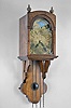 Otto Van Meurs, Amsterdam, Netherlands, wall clock, 3 day, time and strike with calendar and moon phase, weight driven movement in an associated mahogany case, engraved brass dial and chapter ring, applied cast spandrels, and pierced steel hands.