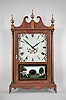 Elmer O. Stennes, Weymouth, Mass., 8 day, time and strike, spring brass movement pillar & scroll shelf clock. It is alleged this is the last clock Stennes made before going to prison.
