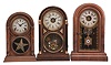 Clocks- 3 (Three): (1) Atkins Clock Co., Bristol, Conn., "Round Top" shelf clock, 8 day, time and strike movement in a rosewood veneered case, c1875; (2) Seth Thomas Clock Co., Thomaston, Conn., "Chicago", 8 day, time and strike with alarm in a rosewood veneered case, c1874; (3) E.N. Welch, "Round Gothic, V.P.", 8 day, time and strike with alarm in a mahogany veneered case, c1885.