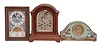 Clocks- 7 (Seven): (1) Gustav Becker, Freiberg, Germany, bracket clock, 8 day, time and strike with Westminster chime in a mahogany case, c1910; (2) Mechatronics Corporation, Stamford, Conn., "Planter's Clock, plug in electric clock with dial to indicate when to sow crops, c1985; (3) Horolover Co., Bronxville, New York, "Ignatz" reproduction flying pendulum novelty clock, c1980; (4) Russia, submarine clock, 8 day, time only, spring driven movement in a metal case, 1990; (5) Kundo, Germany, 400-day clock, year running, time only, spring driven movement, c1970; (6) Kundo, Germany, 400-day clock, year running, time only, spring driven movement in a glazed rectangular case, c1970; (7) Gebruder Junghans, Germany, desk clock, 30 hour, time only, spring driven balance wheel movement in a promotional tin for Victory-V lozenges, c1930.
