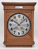 Self Winding Clock Company, New York, "No. 10-A Self Winding Clock", spring driven movement with deadbeat escapement and battery wind mechanism in an oak case with 14 inch aluminum dial reading "Official Time / Western Union ".