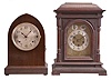 Clocks- 2 (Two) chiming: (1) Seth Thomas Clock Co., Thomaston, Conn., "Chime Clock No. 14" mantel clock, 8 day, time and strike with Westminster chime, spring driven movement with second Sonora chime movement in a mahogany case, c1911; (2) Gebruder Junghans AG, Schramberg, Germany, mantel clock, 8 day, time and strike with Westminster chime, spring driven movement in a mahogany case, c1910.