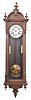 Ansonia Clock Co., New York, "Capitol" hanging timepiece, 8 day, time only, dual weight driven movement in a Vienna-style walnut case with white enamel dial with subsidiary seconds.