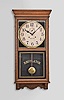 Waterbury Clock Co., Waterbury, Conn., "Stork" wall timepiece, 30 day, time only, twin spring movement in an oak case, 12 inch dial with subsidiary seconds, blued steel spade hands.