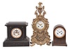 Clocks- 3 (Three) French: lot includes three mantel clocks, 8 day, time and strike, spring driven pendule de Paris movements in cases of mahogany, black slate, and cast brass, all with white enamel dials.