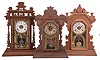 Clocks- 3 (Three): (1) E. N. Welch, "Gounod" mantel clock, 8 day, time and strike with alarm, spring driven movement in a black walnut case, c1889; (2) E. Ingraham, "Garnet" mantel clock, 8 day, time and strike with alarm, spring driven movement in an oak case, c1895; (3) Seth Thomas Clock Co., "Harvard" mantel clock variant, 8 day, time and strike with alarm, spring driven movement in a walnut case, c1893.