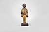Karl Griesbaum, Triberg, Germany, gentleman whistling figure, spring driven brass movement powering air bellows, slide whistle, and turning head motion, hidden within a hand carved wooden figure depicting a black man in a light colored suit, straw hat in hand, whistling a tune.