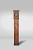 Nicholas Blaisdell, Amesbury, Mass., 30 hour, time and strike, weight driven brass movement in a rustic soft wood case. The brass dial has a pewter chapter ring, calendar aperture, cast brass spandrels and pewter boss with maker's name engraved.