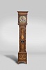 Joan. Klock, Amsterdam, Netherlands, tall clock, 8 day, time and strike with alarm, weight driven movement in a marquetry inlaid mahogany case with flat top and twist columns flanking hood and lenticle glass for pendulum on trunk door resting on bracket feet. The brass dial has Roman numeral chapter ring, calendar aperture and seconds bit with maker's signature below 6.