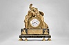 Attributed to Claude Galle, a monumental Verde Antico and gilt bronze mantel clock, "Hector's Farewell to Andromache", the stepped base resting on 6 four paw feet, palmette and bellflower ornamented base molding, the front with bas relief of Hector attempting to convince Paris to defend Troy, and with flanking mounts representing love and fidelity, and surmounted by figures of Hector and Andromache, Hector dressed for battle, and Andromache with a pained expression and holding their son Astyanax, the figures flanking the octagonal clock case containing a large, two train movement of 15 day duration, and with date function, roman numeral white enamel dial with inner date chapter, gilt and engraved brass hands with blued steel date indicator