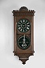 Ithaca Calendar Clock Co., Ithaca, NY, "Hanging Kildare" calendar clock with a spring driven 8 day time and strike E. N. Welch movement and a H. B. Horton patented perpetual calendar mechanism in a mahogany case.