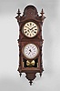 Welch, Spring & Co., Forestville, Conn., "No. 3 Regulator B. W." hanging clock with a double weight driven 8 day timepiece movement and a B. B. Lewis patented perpetual calendar mechanism in a black walnut case.