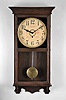 William L. Gilbert Clock Co., Winsted, Conn., "University" wall hanging store regulator with a spring driven 8 day timepiece movement with a 12" Coca Cola advertising dial in a wooden case with a polished mahogany finish.