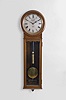 Seth Thomas Clock Co., Thomaston, Conn., "Regulator No. 62" wall clock, 8 day, time only, weight driven movement in a mahogany case with meter long pendulum, maintaining power and silvered dial