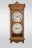 Seth Thomas Clock Co., Thomaston, Conn., "Office Calendar No. 13" wall hanging clock with a weight driven 8 day timepiece movement, maintaining power and an R. T. Andrews patented perpetual calendar mechanism in an oak case.