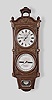 Seth Thomas Clock Co., Thomaston, Conn., "Office Calendar No. 8" wall clock, 8 day, time and perpetual calendar, weight driven movement in a walnut and burl walnut case with canopy top, glazed pendulum aperture and painted metal dials, and damascened pendulum bob
