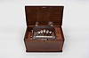 Switzerland, music box, playing 12 tunes with a 9.25 inch cylinder playing on a one piece comb with 44 teeth and five tuned bells, all mounted in a rosewood veneered box with string inlay on the front and top
