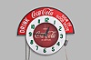 Clocks- 2 (Two) Coca Cola electric backlit advertising clocks: (1) Large period sign advertising "DRINK Coca Cola SIGN OF GOOD TASTE" with 24.5" plastic dial reading "DRINK IN BOTTLES "; (2) Small reproduction in 50's style