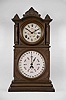 E. Ingraham & Co., Bristol, Conn., "Ingraham Calendar" shelf clock with a spring driven 8 day time and strike movement with a B. B. Lewis patented perpetual calendar mechanism in a walnut case.