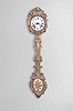 France, Morbier or Comtoise clock, 8 day, time and strike with simple calendar, weight driven movement with anchor escapement in an iron post and plate frame, convex white enamel dial with Roman numerals signed "Dufour Ernee", press brass fronton and matching pendulum with scroll design, two pierced brass hands an one iron hand.
